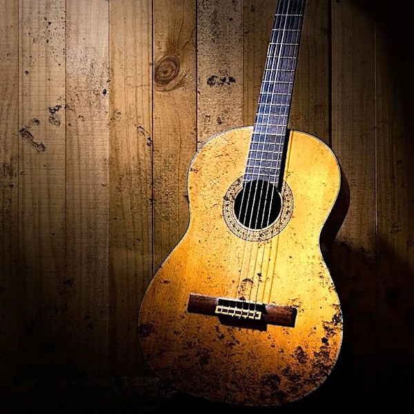 Guitarist Titus Tucker Criticizes American Airlines for Damaging Acoustic Guitar