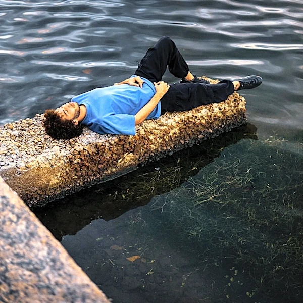 Cubans Endure Blackouts and Heat by Sleeping on Havana's Seaside Boardwalk