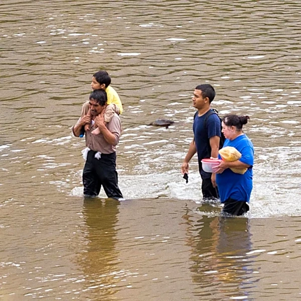 Iowa Woman Rescued by Power Crew After Being Stranded in Mud with Broken Leg