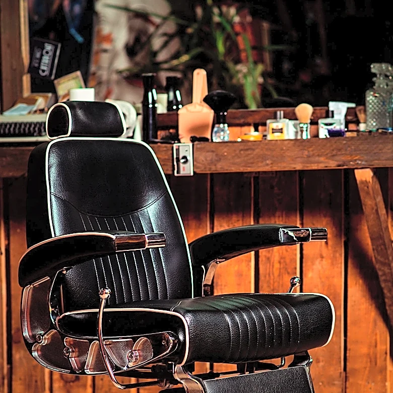 Historical Context of White Barbering Practices Highlighted in Early 20th Century Ads