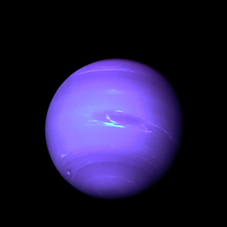 Neptune's Vanishing Storms: Insights from Voyager 2 and Hubble