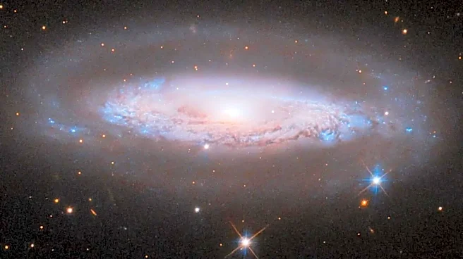 Hubble and James Webb Telescopes Collaborate to Capture 'Black Eye Galaxy' in Composite Image