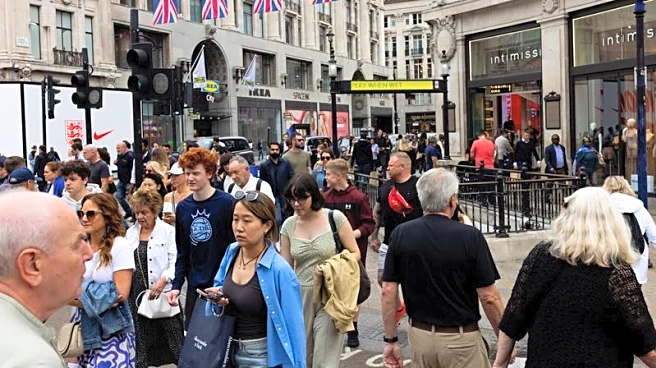 UK consumers spent more on clothes as temperatures soared in July, data shows