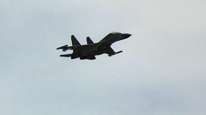 Chinese fighter 'intercepts' Philippine plane over disputed shoal, Manila says