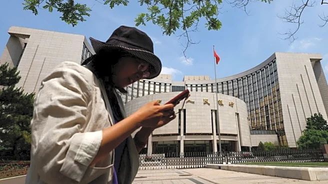 China leaves benchmark lending rates unchanged, matching forecast