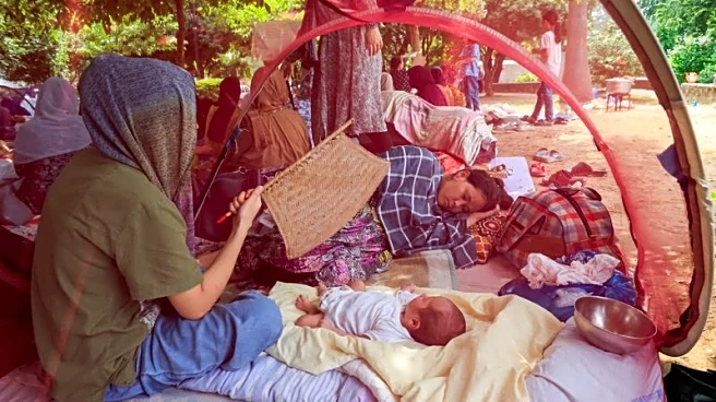 Evicted Afghan refugees huddle in Islamabad park, dreading return home