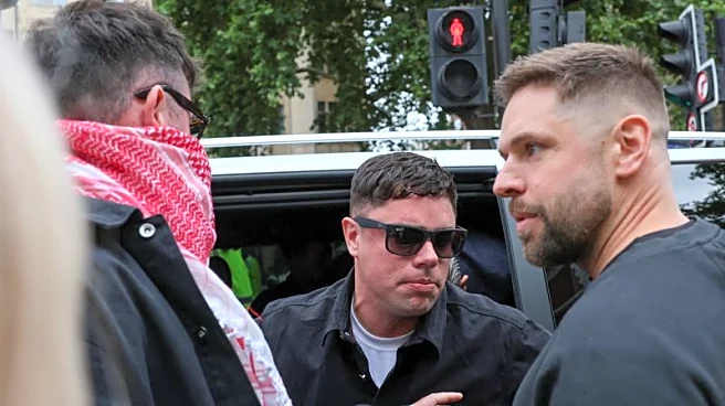 Member of Irish rap group Kneecap appears at UK court on terrorism charge