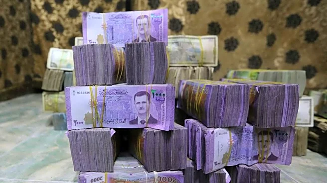 Exclusive-Syria to revalue currency, dropping two zeros in bid for stability, sources say