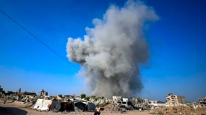 Israel pounds Gaza City suburbs, vows to press on with offensive