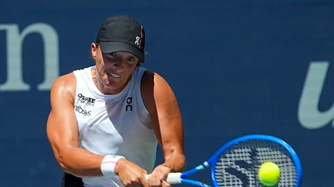 Tennis-Swiatek swats aside Arango in US Open first round