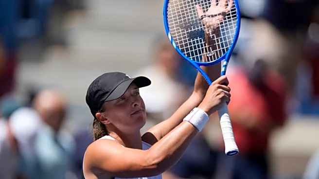 Tennis-Swiatek eases into US Open second round, Gauff highlights evening session