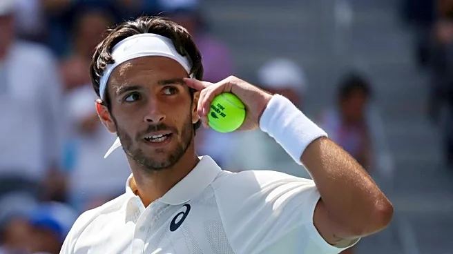 Tennis-Musetti battles back to beat Mpetshi Perricard at US Open