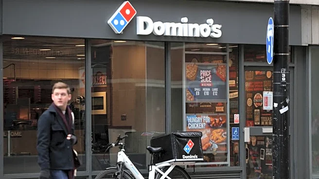 Domino's Australian franchise operator swings to first annual loss, shares tank 20%