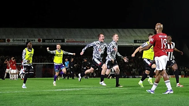 Soccer-Man Utd misery continues with League Cup shootout defeat to Grimsby