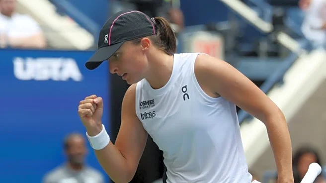 Tennis-Swiatek survives second-set scare to reach US Open third round