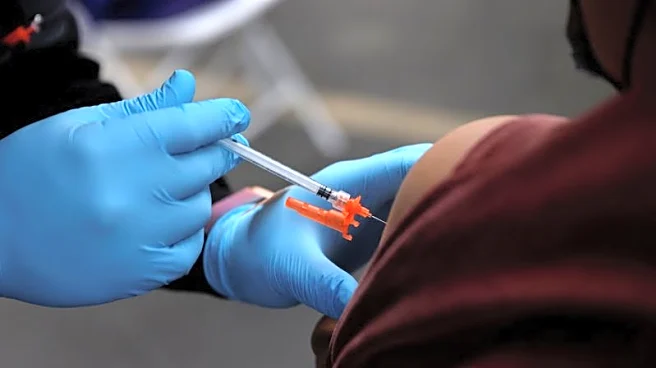 US insurers likely to cover updated COVID shots this year, industry sources say