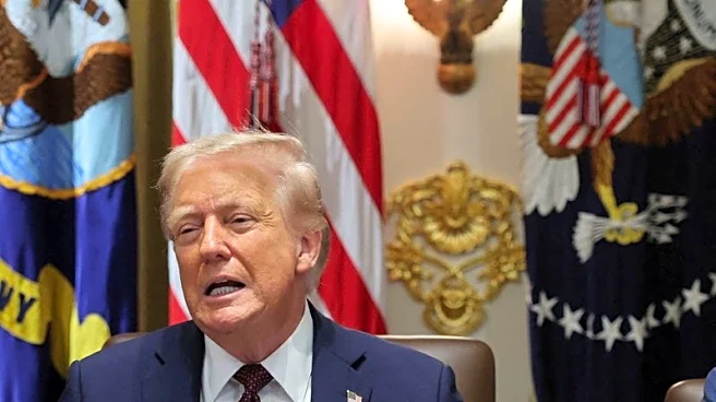 Analysis-Seeking more power, Trump uses firings to test presidential limits