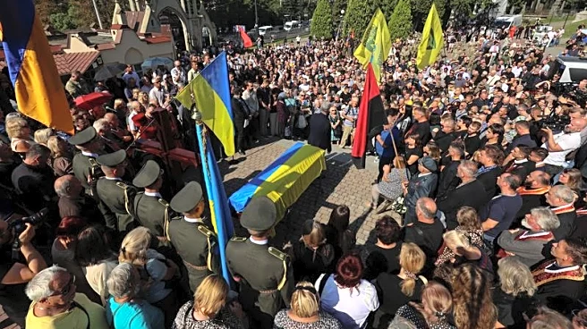 Former Ukraine parliament speaker laid to rest after assassination