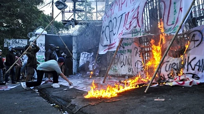 With brooms in hand as symbol for change, Indonesian women join Jakarta protests