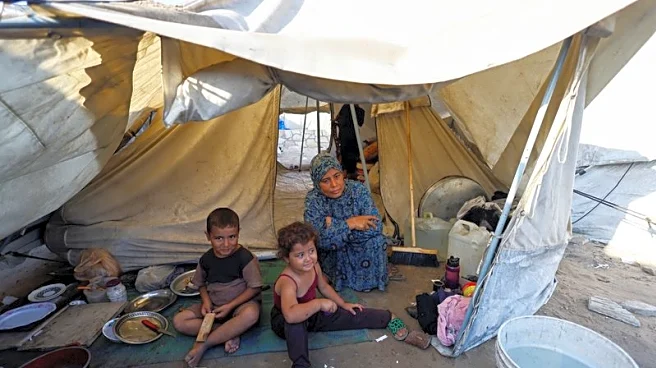 Israeli bombardment pushes more Palestinians out of homes in Gaza City