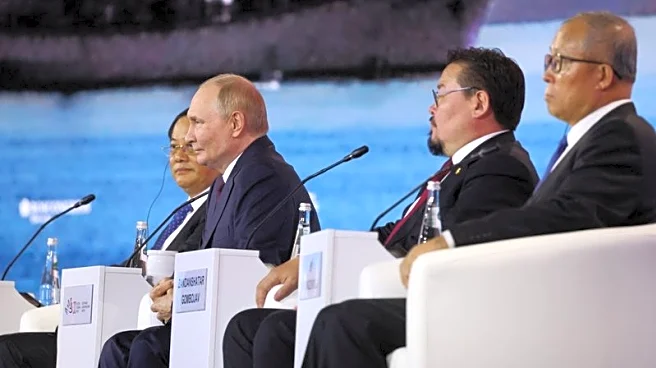 Russia's Putin says economy is not stagnating, defends tight monetary policy