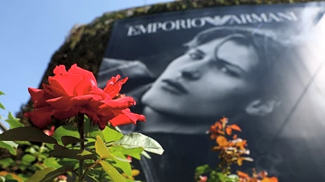A lone red rose outside Armani as Milan mourns its 'king' of fashion