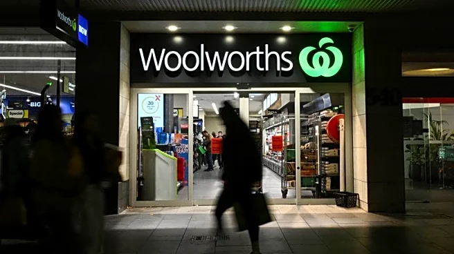Woolworths, Coles flags extra costs after staff underpayments ruling