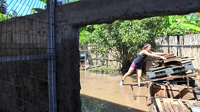 Waters recede in Bali after floods kill 16 people, with two still missing