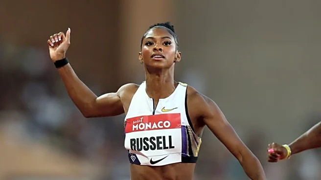 Athletics-Russell's alter ego sees 100m hurdles world record tumbling