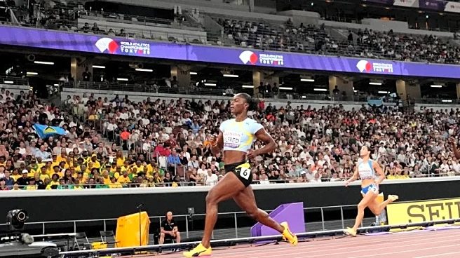 Athletics-Jefferson-Wooden and Alfred cruise through 100 metres heats