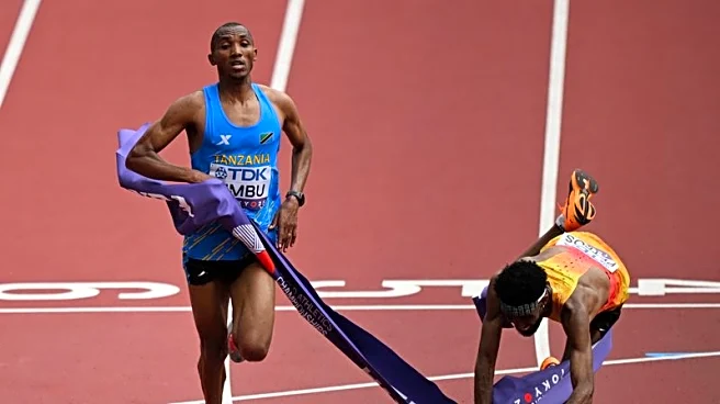 Athletics-Simbu snatches marathon gold from Petros at the line