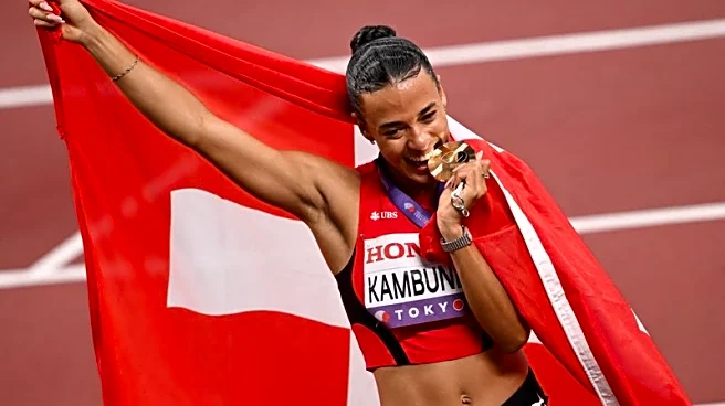Athletics-Swiss Kambundji takes shock world 100m hurdles crown
