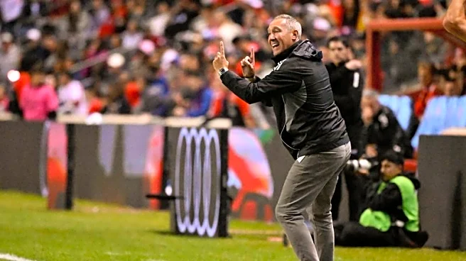 Revolution fire head coach Caleb Porter