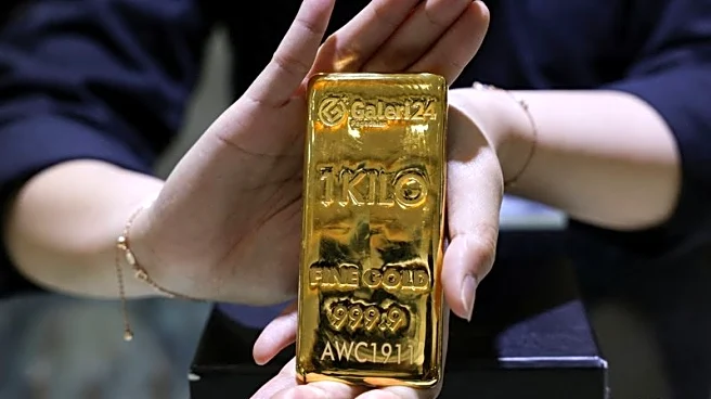 Factbox-JP Morgan raises gold outlook on investor interest, central bank buying