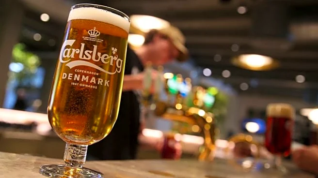 Carlsberg weighed down by weak consumer spending