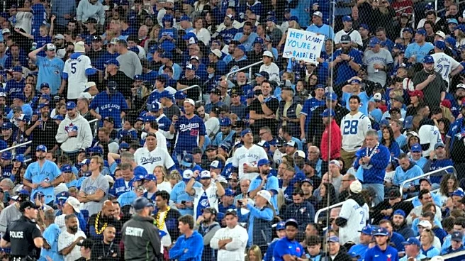 Father-son Blue Jays fans walk away winners from World Series Game 7