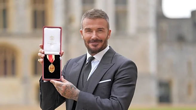 David Beckham knighted for services to sport and charity