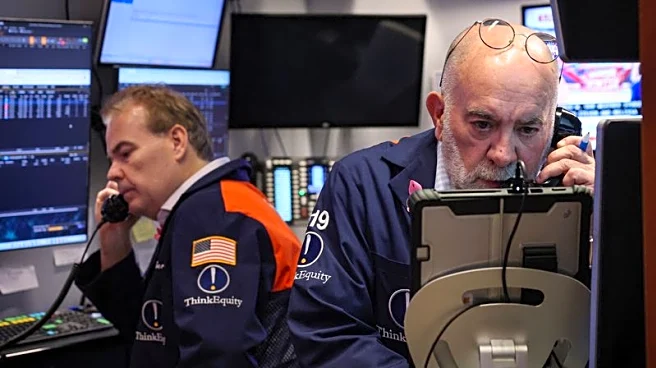 Wall St futures subdued as Qualcomm dips, focus on economic data