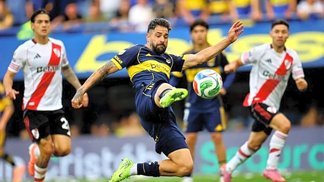 Soccer-Boca heap more misery on River with 2-0 Superclasico win
