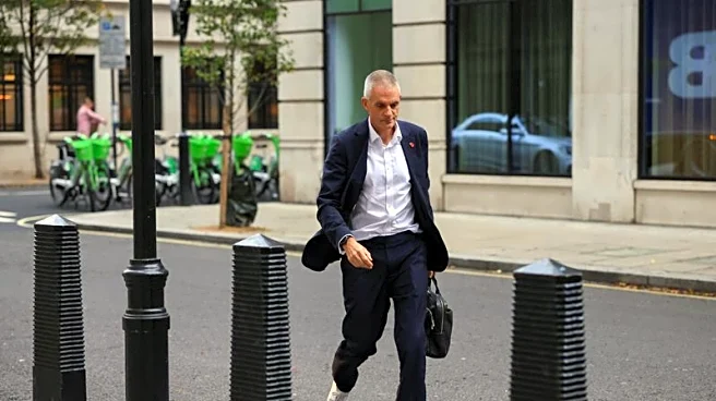 Britain's outgoing BBC boss praises its journalism despite crisis