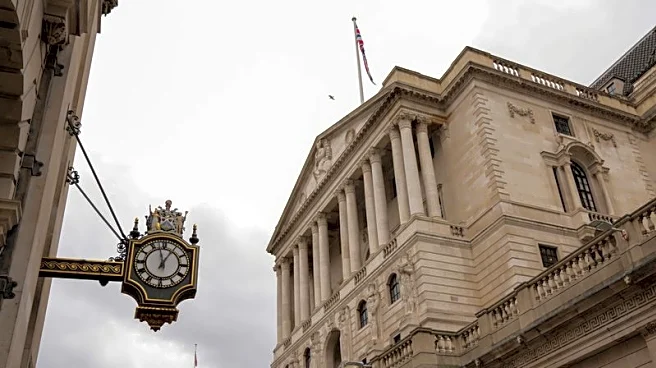 Bank of England sees wider QE benefits cushioning big losses