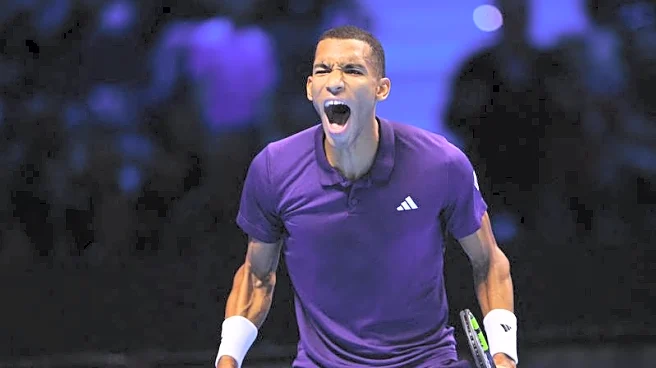 Tennis-Auger-Aliassime off the mark at ATP Finals with battling win over Shelton