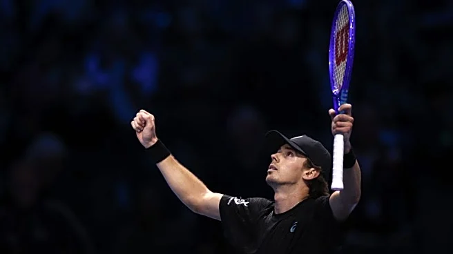 Tennis-De Minaur keeps ATP Finals hopes alive with win over Fritz