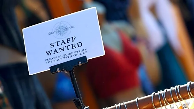 UK's jobs downturn abates slightly ahead of budget, survey shows