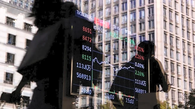 Global investors pull back, cautious over tech valuations and US labour