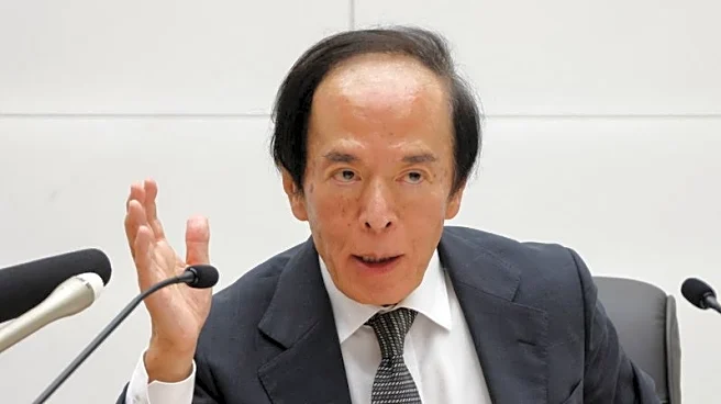 BOJ governor warned panel of prolonged loose policy risks, minutes show