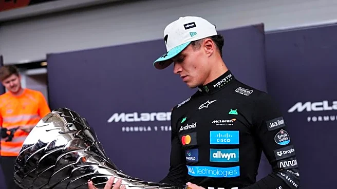 Motor racing-Norris in the zone and not bothered by booing, says Brown