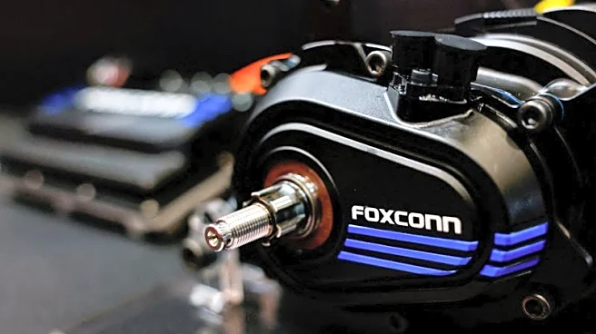 Foxconn to spend up to $3 billion a year on AI, chair sees China EV shakeout