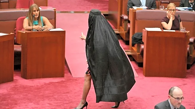Australian far-right senator wears burqa to parliament, sparking outrage