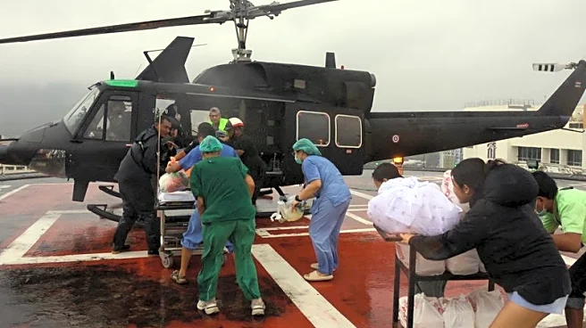 Thailand airlifts patients, rushes supplies as floods in south kill 33